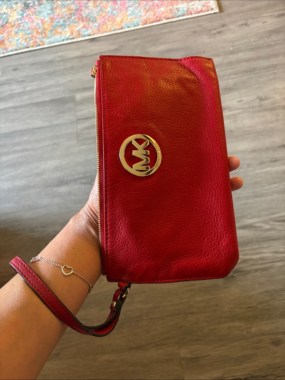 Michael Kors Red large pebbled Leather Wristlet with Gold MK Emblem